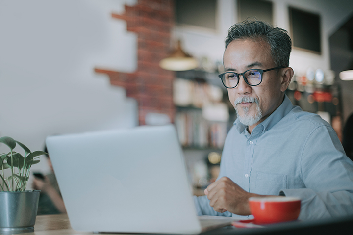 Photo of person working with the application and technology